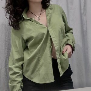 green button-up blouse